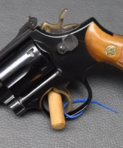 Smith & Wesson Modell 19-3, brüniert, Kaliber 357 Mag, 2,5″ Lauf, Holzgriff, sehr gut
